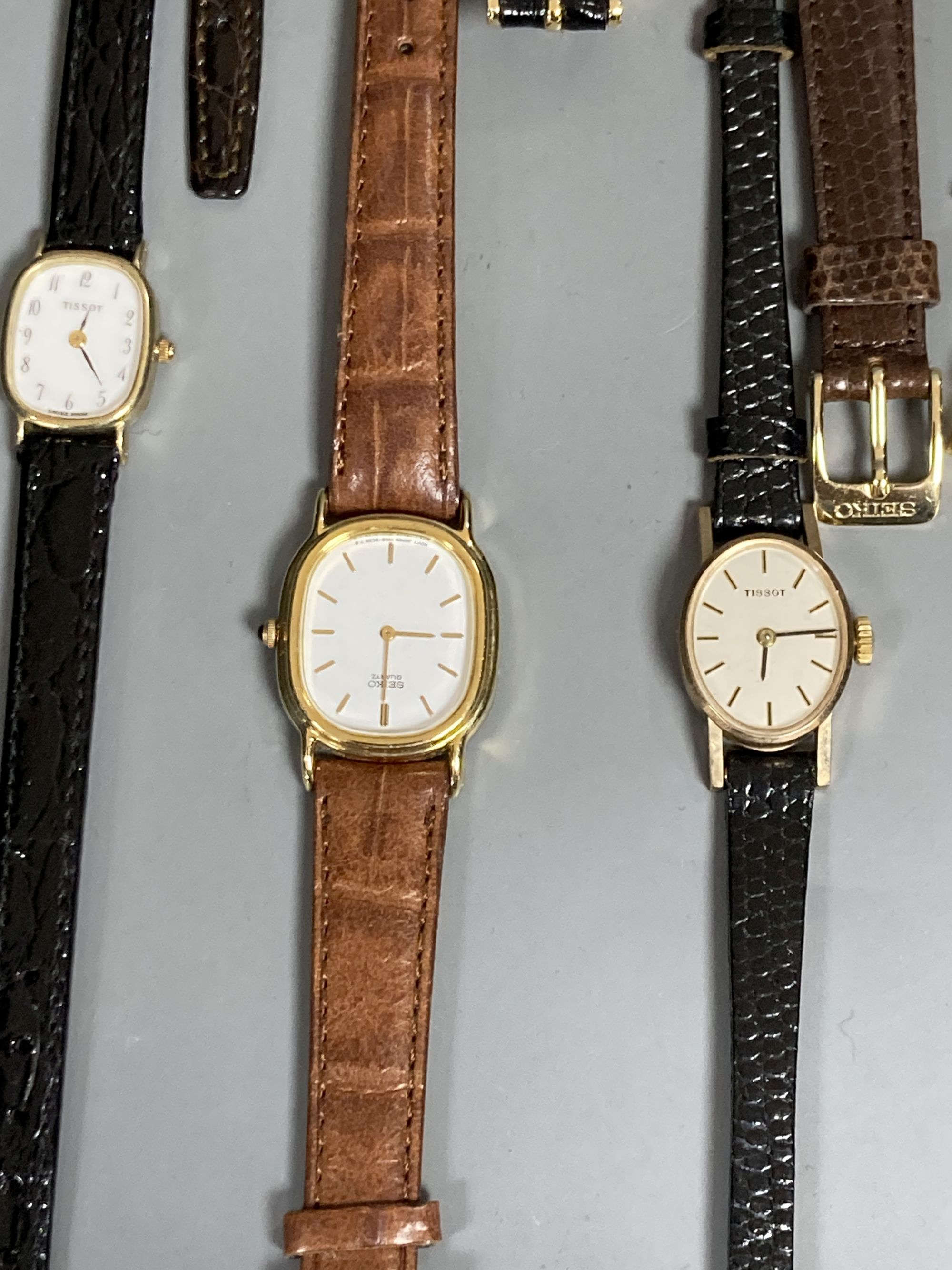 Three lady's 9ct gold wrist watches including two quartz, gross 29.9 grams and sixteen assorted lady's modern Seiko wrist watches.
